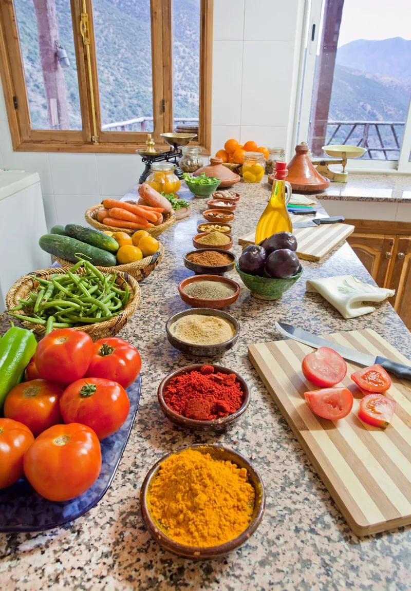 Vegetables and Moroccan spices laid out for the cooking workshop