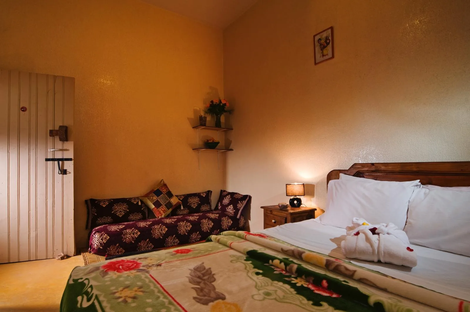 Junior en-suite room in warm ochre tones