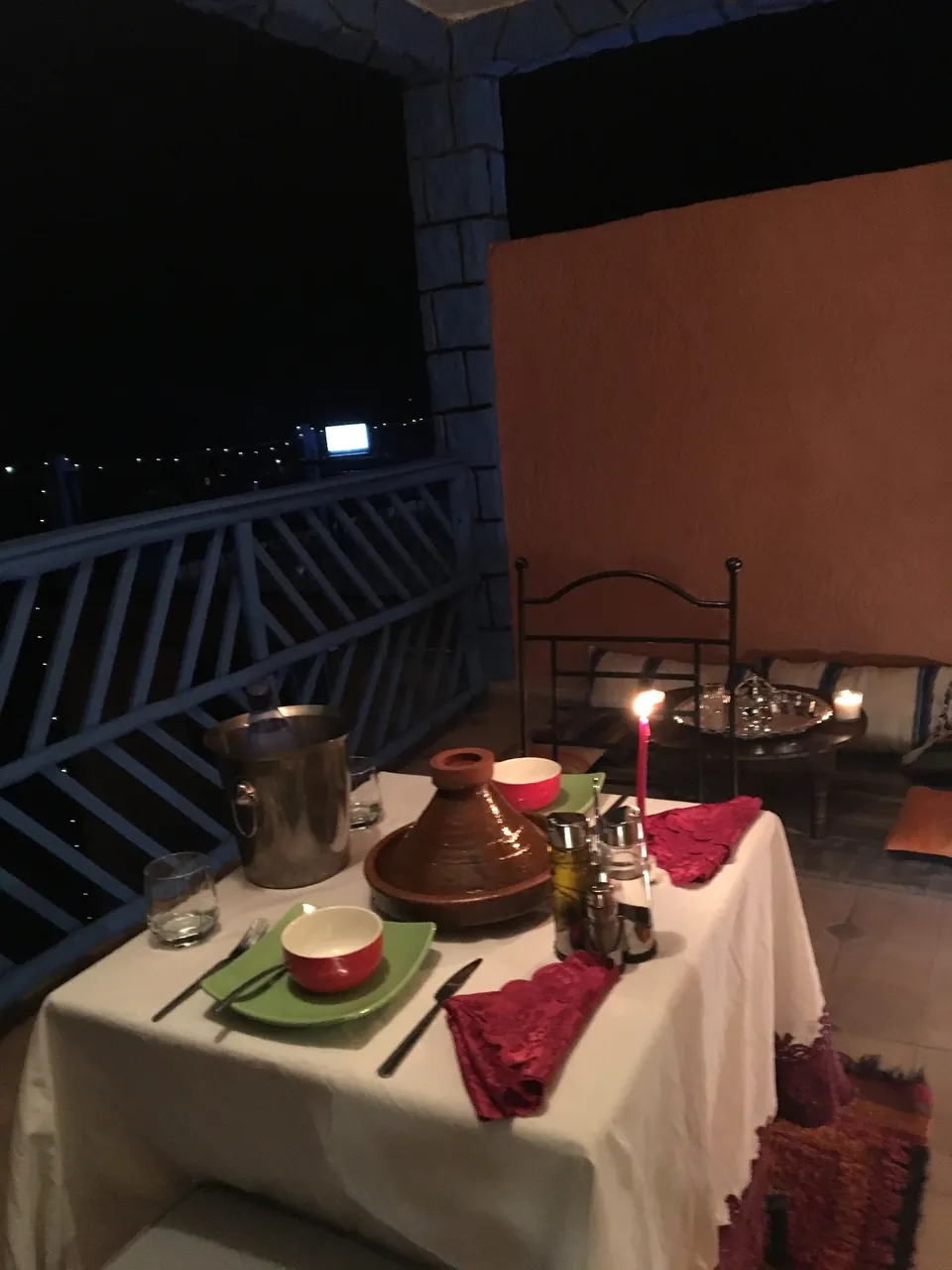 Candlelit dinner on the Dar Tassa terrace under the Atlas night sky