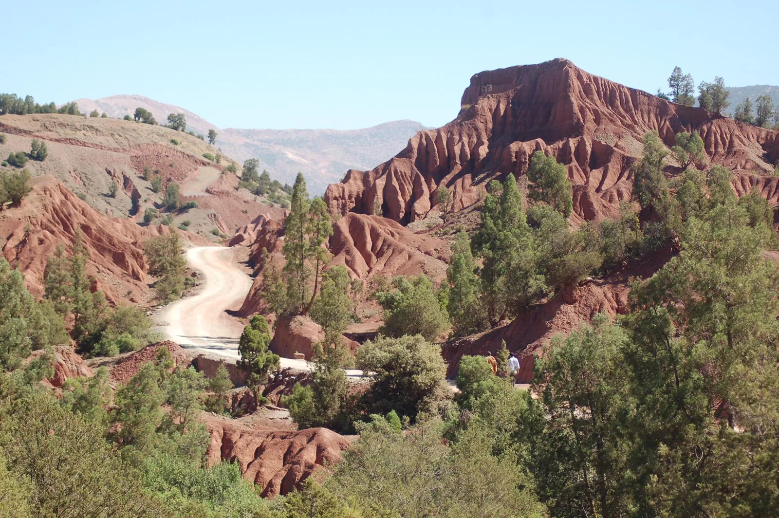 Red rock ridges above the valley road