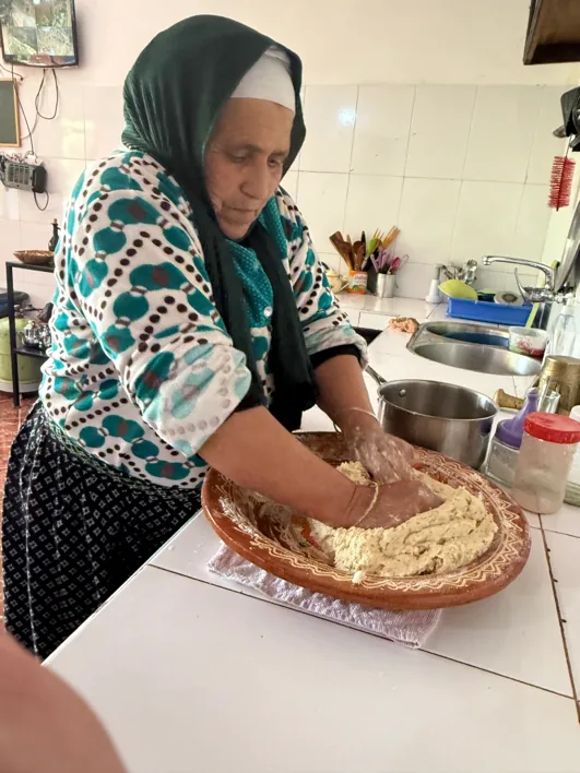 Kneading dough for traditional Amazigh bread